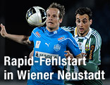Pavel Kostal (SC Magna Wiener Neustadt) und Atdhe Nuhiu (Rapid Wien)