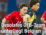 Der Belgier Axel Witsel trickst Julian Baumgartlinger aus
