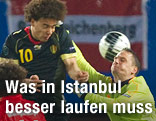 J&uuml;rgen Macho und Axel Witsel im Luftduell