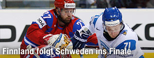 Konstantin Barulin, Vitali Atyushov (Russland) und  Leo Komarov (Finnland)