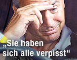 Peter Pacult greift sich mit den Fingern an die Augenbrauen.
