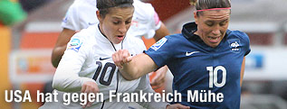 Carli Lloyd (USA) gegen Frankreichs Camille Abily