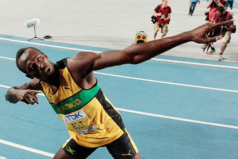 © AP/David J. Phillip Jubel von Sprinter Usain Bolt (Jamaika)