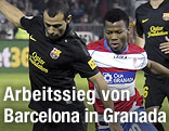 Javier Mascherano (Barcelona) und Dani Benitez (Granada)