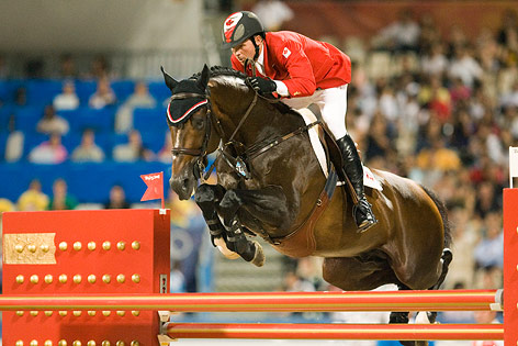 © Reuters/Caren Firouz Eric Lamaze auf dem Sprungpferd Hickstead bei den Olympischen Spielen