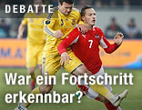 Artem Fedetskiy (UKR) und Marko Arnautovic (AUT)