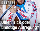 Skifahrer zieht Skianzug an