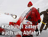 Helfer auf der Piste