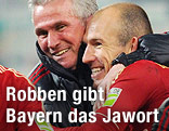 Trainer Jupp Heynckes und Arjen Robben (Bayern M&uuml;nchen) umarmen sich