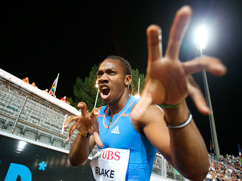 © Reuters/Pascal Lauener Yohan Blake macht eine Raubkatze nach