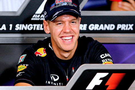 © APA/EPA/Diego Azubel Ein lachender Sebastian Vettel (RB Racing)