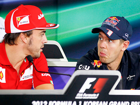 © APA/EPA/Diego Azubel Fernando Alonso, Ferrari, und Sebastian Vettel, Red Bull Racing