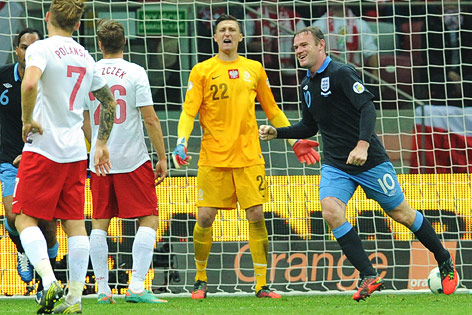 © dapd/AP/Alik Keplicz Wayne Rooney jubelt