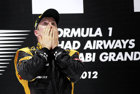 © GEPA/XPB Images/Batchelor Der Finne Kimi Räikkönen (Lotus) bei der Siegerehrung