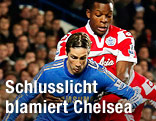 Fernando Torres (Chelsea) und Nedum Onuoha (QPR) im Zweikampf