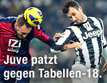 Kopfballduell von Andreas Granqvist (Genua) und Mirko Vucinic (Juventus)