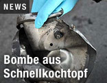 Reste eines Druckkochtopf-Deckels