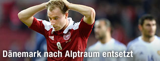 Christian Erikson (DEN) schlägt sich die Hände über seinen Kopf