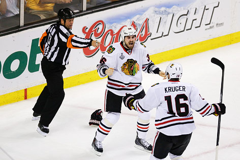 © AP/Charles Krupa
Dave Bolland feiert mit Marcus Kruger (beide Chicago Blackhawks )