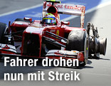 Felippe Massa (BRA/Ferrari) fährt mit einem geplatzten reifen in die Box