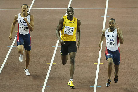 © AP/Mark Baker Tyson Gay vor Usain Bolt