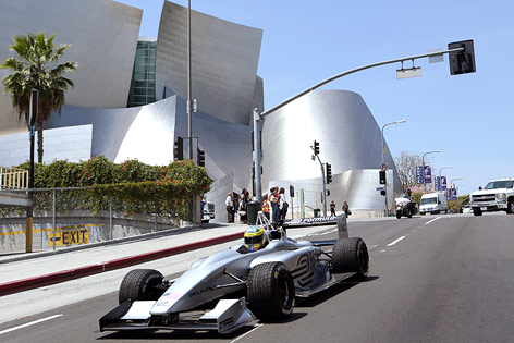 © AP/Forumla E Holdings/Rene Macura Lucas di Grassi fährt mit einem Formel-E-Wagen durch Los Angeles