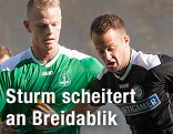 Nichlas Rohde (Breidablik) und Christian Klem (Sturm) im Zweikampf
