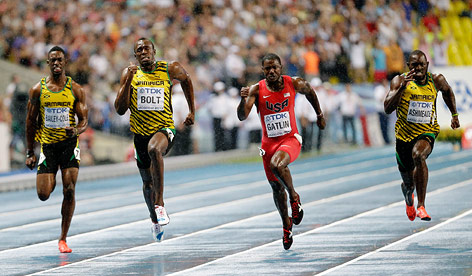 © AP/Anja Niedringhaus Kemar Bailey-Cole (Jamaica), Usain Bolt (Jamaica), Justin Gatlin (USA), and Nickel Ashmeade (Jamaica)