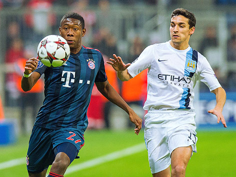 © APA/EPA/Marc Müller David Alaba (Bayern) und Jesus Navas (Manchester City)