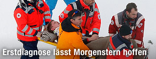 Thomas Morgenstern auf einer Bare