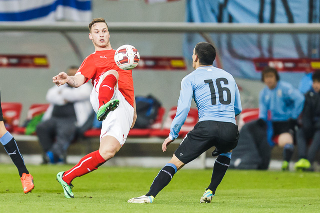 Spielszene von Österreich - Uruguay