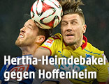 Kopfballduell zwischen Julian Schieber (Hertha) und Ermin Bicakcic (Hoffenheim)