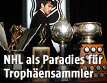 Alexander Ovechkin hinter NHL-Trophäen