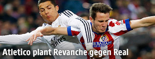 Saul Niguez (Atletico Madrid) und Cristiano Ronaldo (Real)