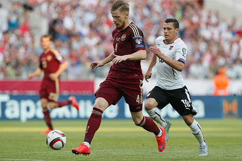 © Reuters/Maxim Zmeyev Aleksandr Kokorin (RUS) und Aleksandar Dragovic (AUT)