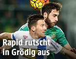 Daniel Schuetz (Grödig) und Thanos Petsos (Rapid)