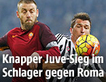 Mario Mandzukic (Juventus) und Daniele De Rossi (AS Roma)