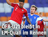 Valentino Lazaro (Österreich) und Gestur Dam (Färöer)