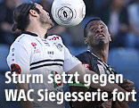 Wilson Kamavuaka (Sturm) und Nemanja Rnic (Wolfsberg)