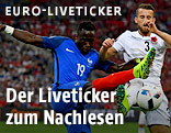 Dimitri Payet (FRA) und Burim Kukeli (ALB)