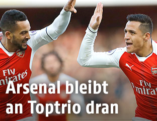 Jubel von Arsenals Alexis Sanchez und Theo Walcott