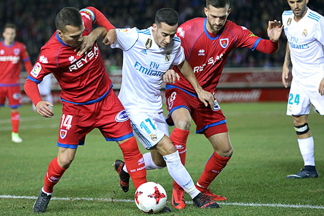 © APA/AFP/Cesar Manso Luis Valcarce (Numancia), Grego (Numancia) und Lucas Vazquez (Real)