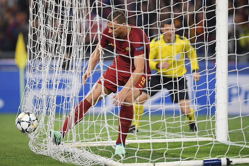 © APA/AFP/Lluis Gene Dzeko