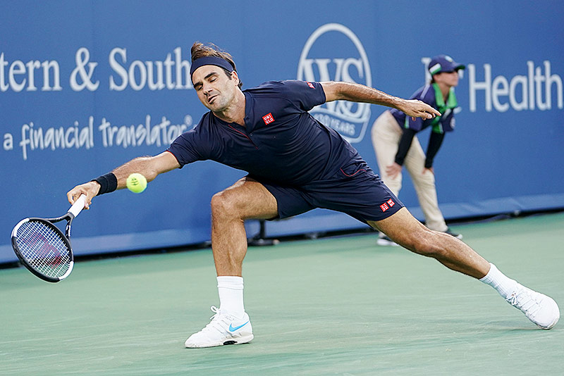 © AP/John Minchillo Roger Federer